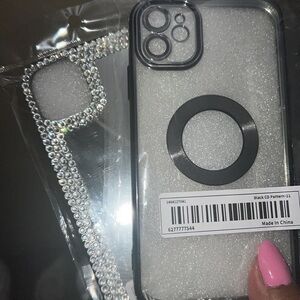 Two beautiful I phone 11 cases , one with silver rhinestones and one is black